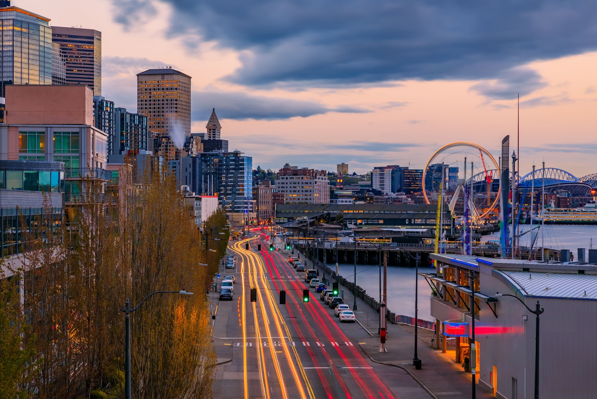 Seattle waterfront skyline and the Puget Sound at sunset in Seattle, Washington